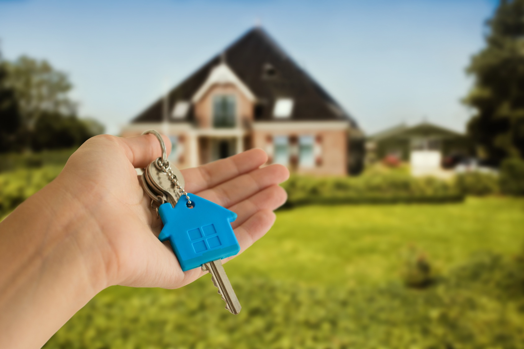 Homeowner's hand with keys