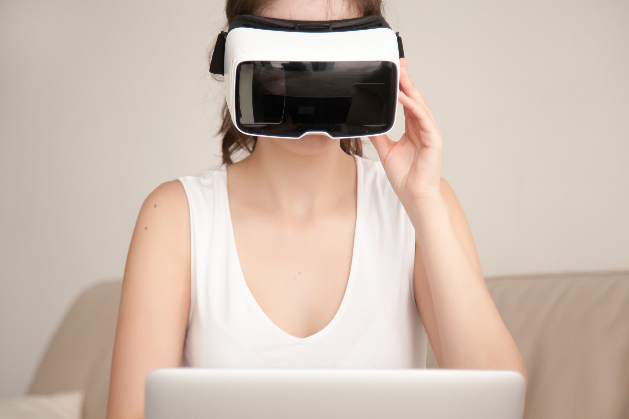 A woman wearing a virtual reality headset